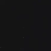 Dark gray speckled texture with random distribution, uniform tone, and diffused lighting across a solid black background, creating a subtle pattern.